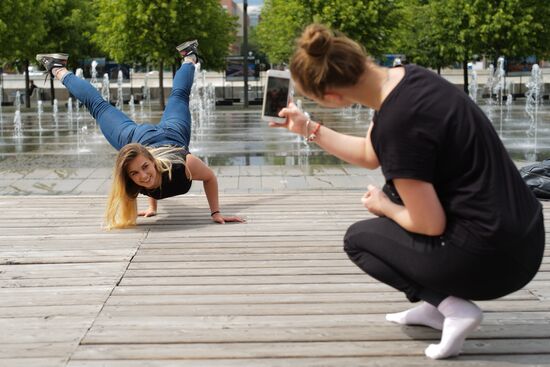 People relax at Museon arts park in Moscow
