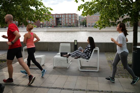 People relax at Museon arts park in Moscow