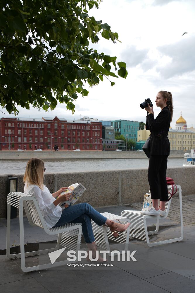 People relax at Museon arts park in Moscow