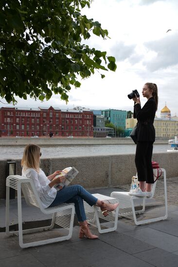People relax at Museon arts park in Moscow