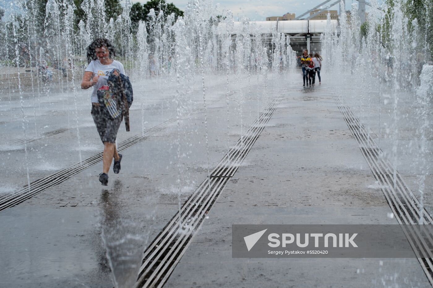 People relax at Museon arts park in Moscow