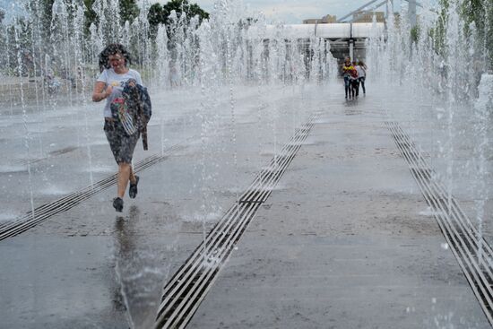 People relax at Museon arts park in Moscow