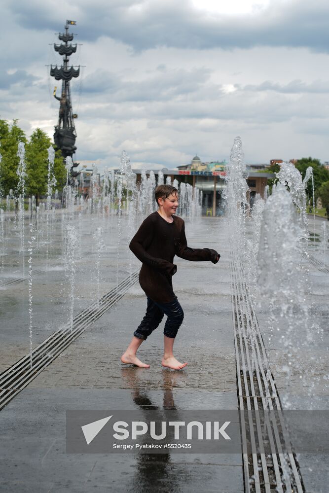 People relax at Museon arts park in Moscow