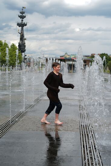 People relax at Museon arts park in Moscow