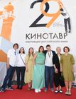 Director Natalya Meshchanova, fourth left, the cast and crew before the premiere of her film Heart of the World as part of the 29th Kinotavr Open Russian Film Festival in Sochi. Location: Russia, Sochi. Author: Ekaterina Chesnokova/Sputnik. 29th Kinotavr Open Russian Film Festival. Day Seven