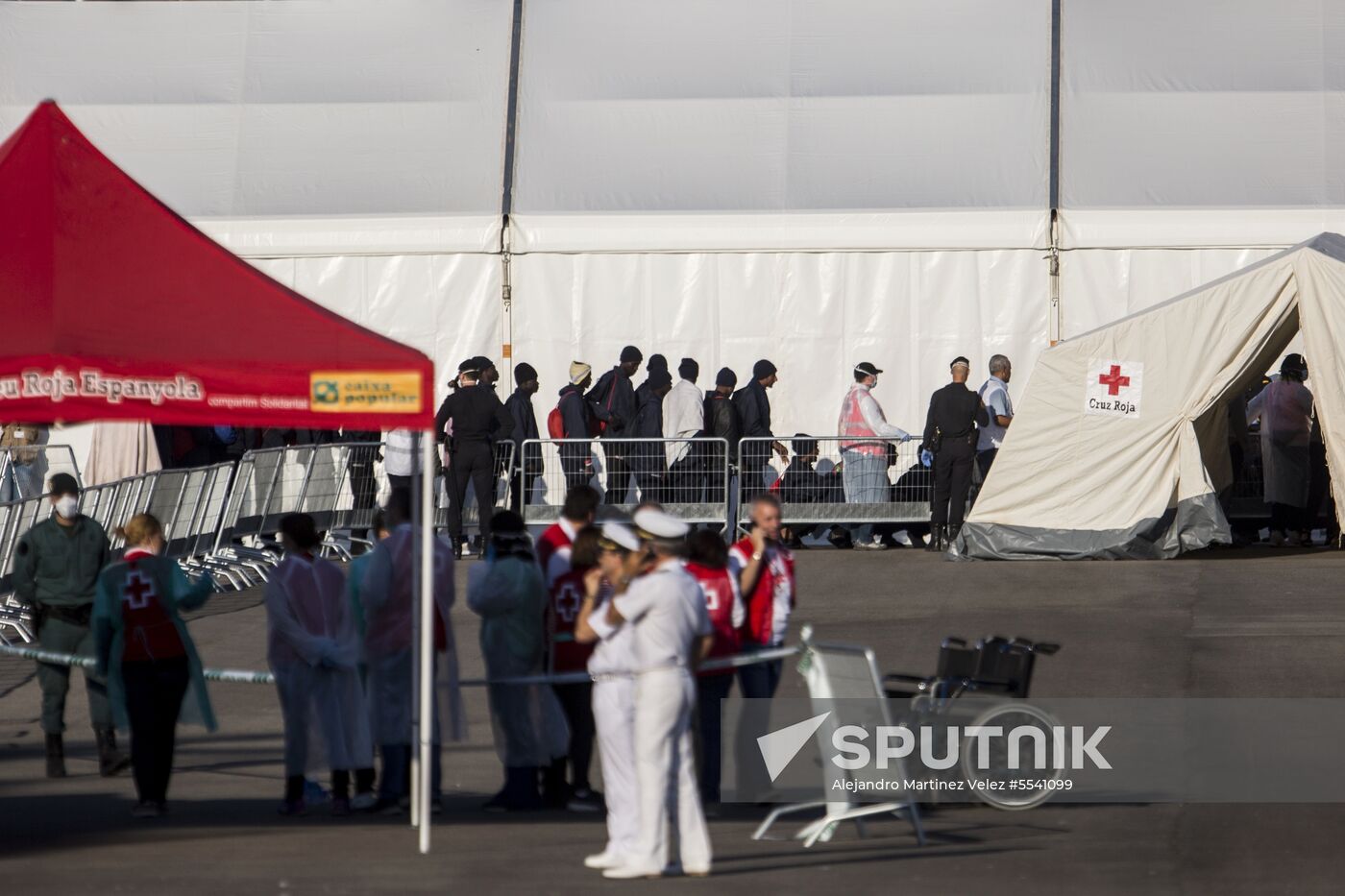 Three vessels carrying migrants dock in Spain