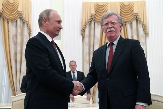 Russian President Vladimir Putin meets with US National Security Adviser John Bolton