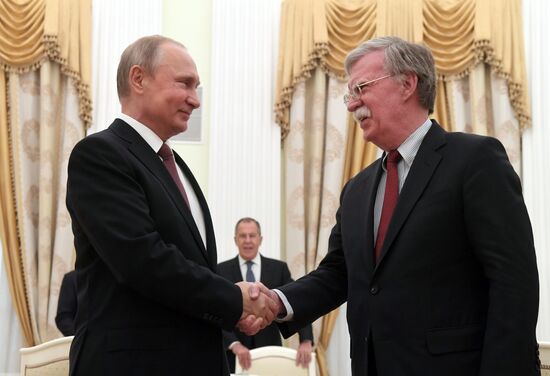 Russian President Vladimir Putin meets with US National Security Adviser John Bolton