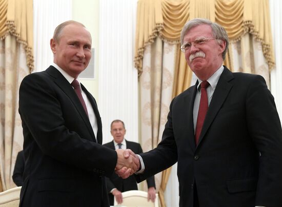 Russian President Vladimir Putin meets with US National Security Adviser John Bolton