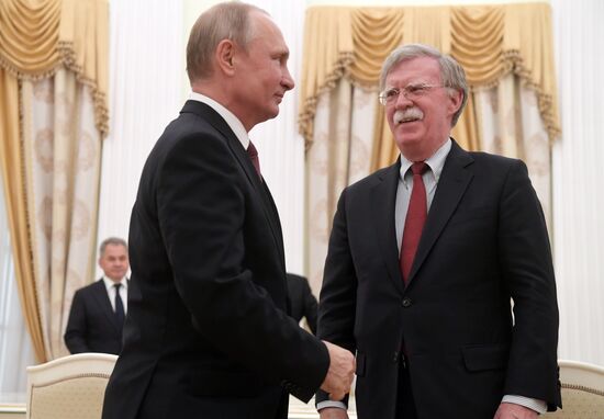 Russian President Vladimir Putin meets with US National Security Adviser John Bolton