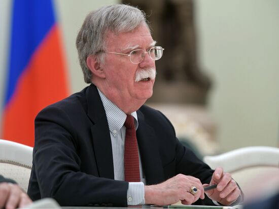 Russian President Vladimir Putin meets with US National Security Adviser John Bolton