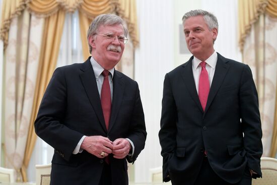 Russian President Vladimir Putin meets with US National Security Adviser John Bolton