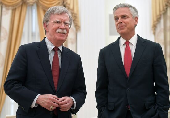 Russian President Vladimir Putin meets with US National Security Adviser John Bolton
