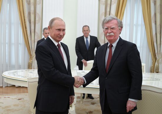 Russian President Vladimir Putin meets with US National Security Adviser John Bolton