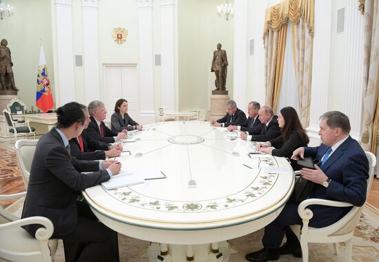 Russian President Vladimir Putin meets with US National Security Adviser John Bolton