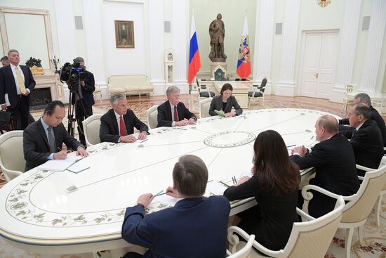 Russian President Vladimir Putin meets with US National Security Adviser John Bolton