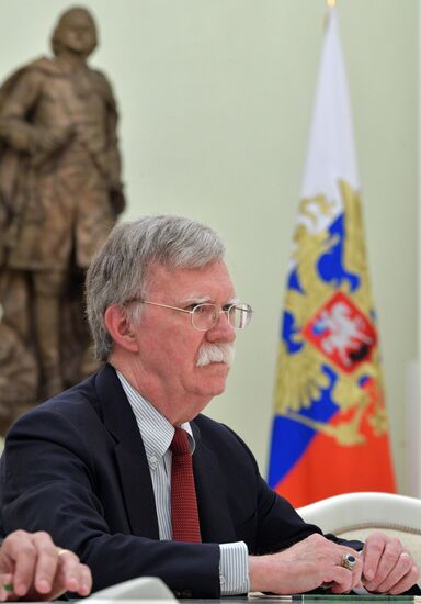 Russian President Vladimir Putin meets with US National Security Adviser John Bolton
