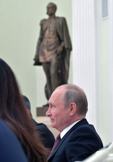Russian President Vladimir Putin meets with US National Security Adviser John Bolton