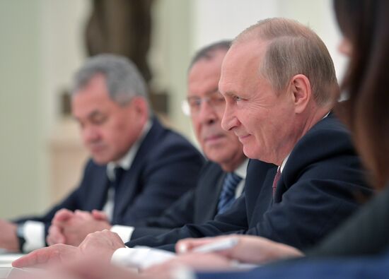 Russian President Vladimir Putin meets with US National Security Adviser John Bolton
