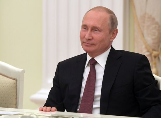 Russian President Vladimir Putin meets with US National Security Adviser John Bolton