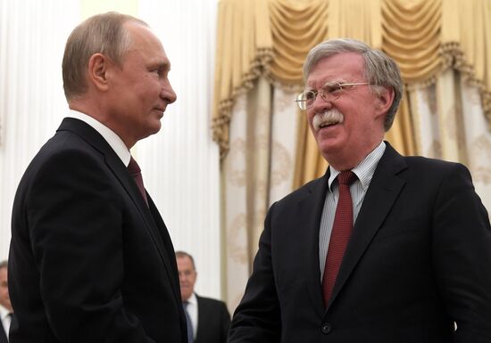 Russian President Vladimir Putin meets with US National Security Adviser John Bolton