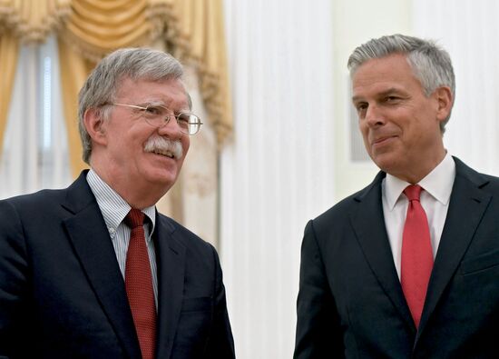 Russian President Vladimir Putin meets with US National Security Adviser John Bolton