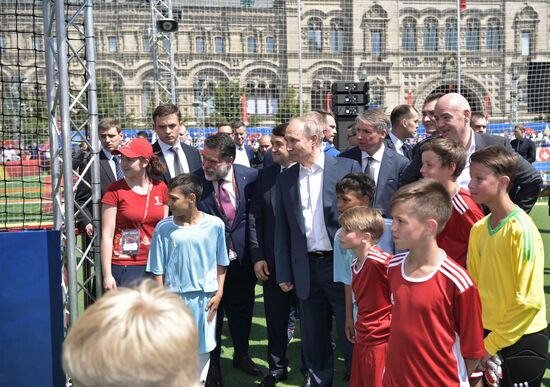 Russian President Vladimir Putin visits Football Park on Red Square