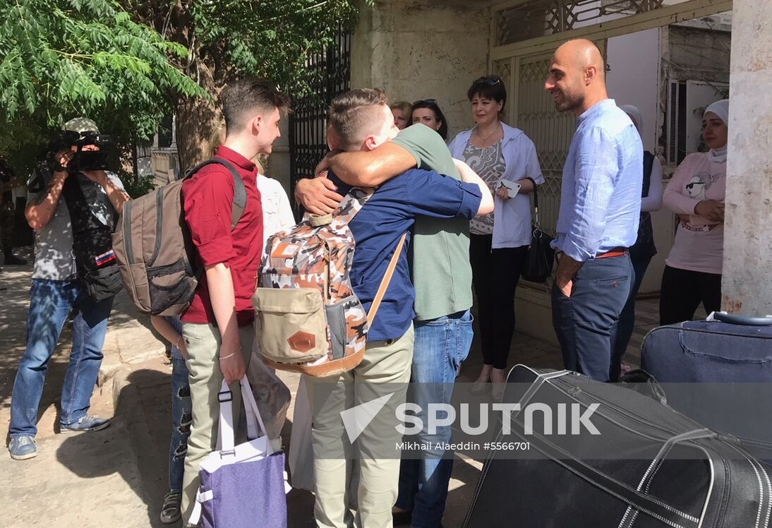 Irina Bakarat's family before flying to Russia