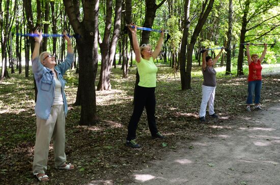 Senior citizens engage in Nordic walking