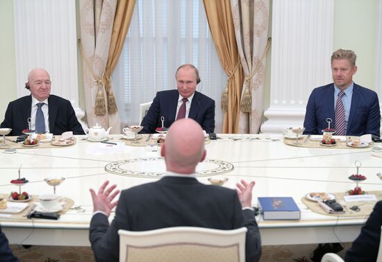 President Vladimir Putin meets with world football legends