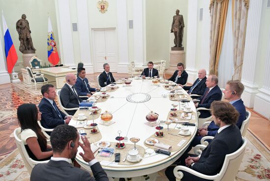 President Vladimir Putin meets with world football legends