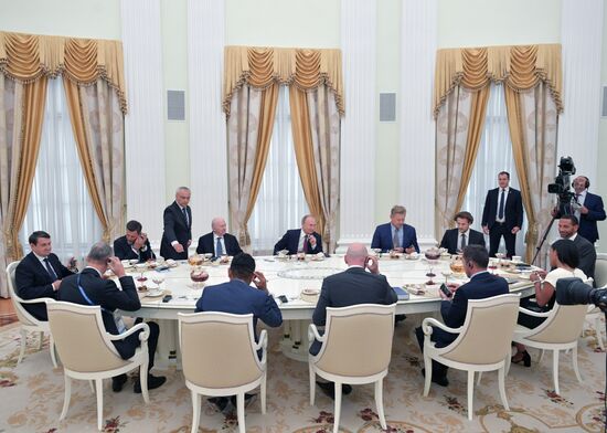 President Vladimir Putin meets with world football legends