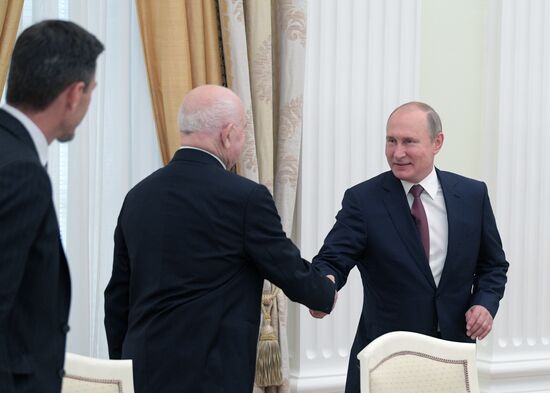 President Vladimir Putin meets with world football legends