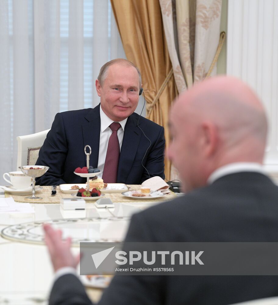 President Vladimir Putin meets with world football legends