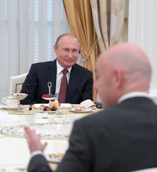 President Vladimir Putin meets with world football legends