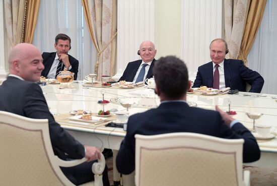 President Vladimir Putin meets with world football legends