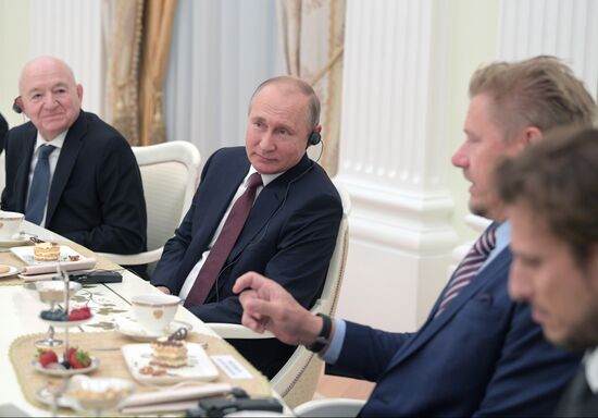 President Vladimir Putin meets with world football legends