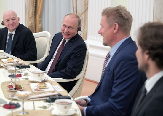 President Vladimir Putin meets with world football legends