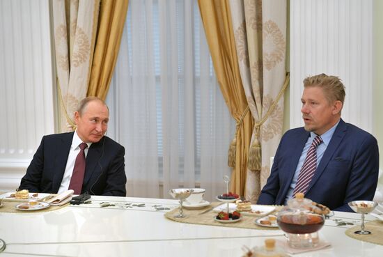 President Vladimir Putin meets with world football legends