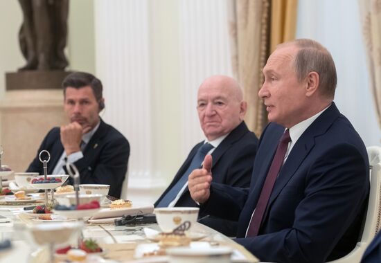President Vladimir Putin meets with world football legends