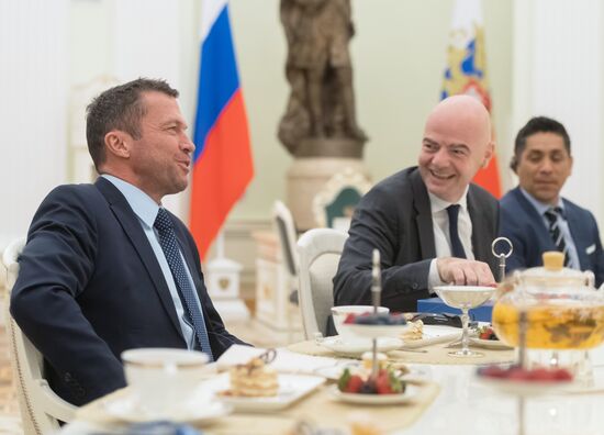 President Vladimir Putin meets with world football legends