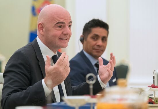 President Vladimir Putin meets with world football legends