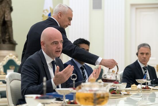 President Vladimir Putin meets with world football legends