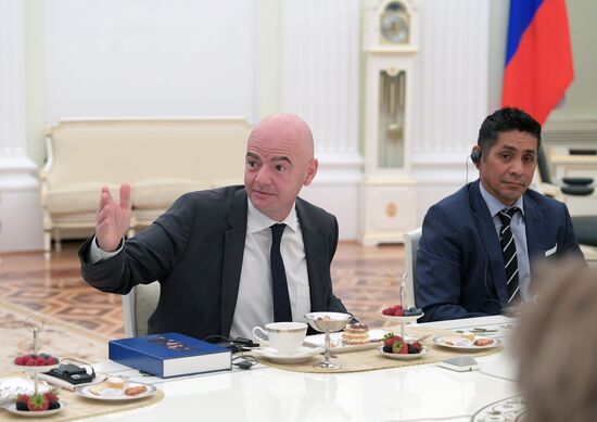 President Vladimir Putin meets with world football legends
