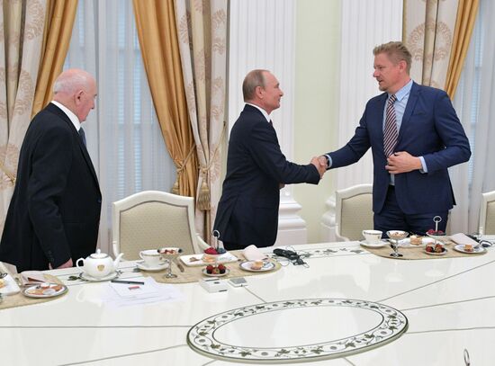 President Vladimir Putin meets with world football legends