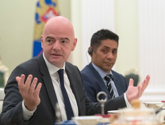 President Vladimir Putin meets with world football legends