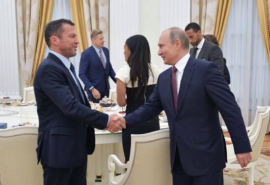 President Vladimir Putin meets with world football legends