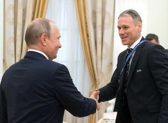 President Vladimir Putin meets with world football legends