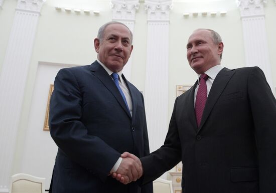 Russian President Vladimir Putin meets with Israeli Prime Minister Benjamin Netanyahu