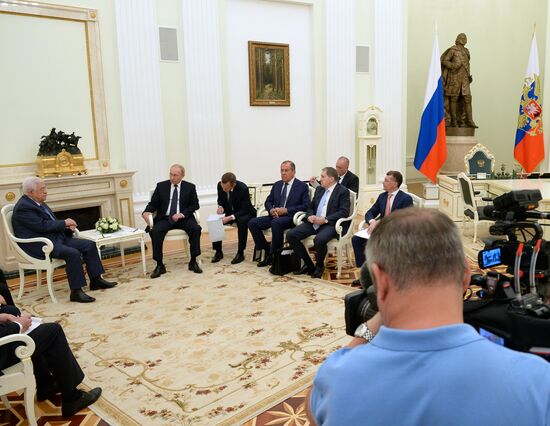 President Vladimir Putin meets with Palestinian President Mahmoud Abbas